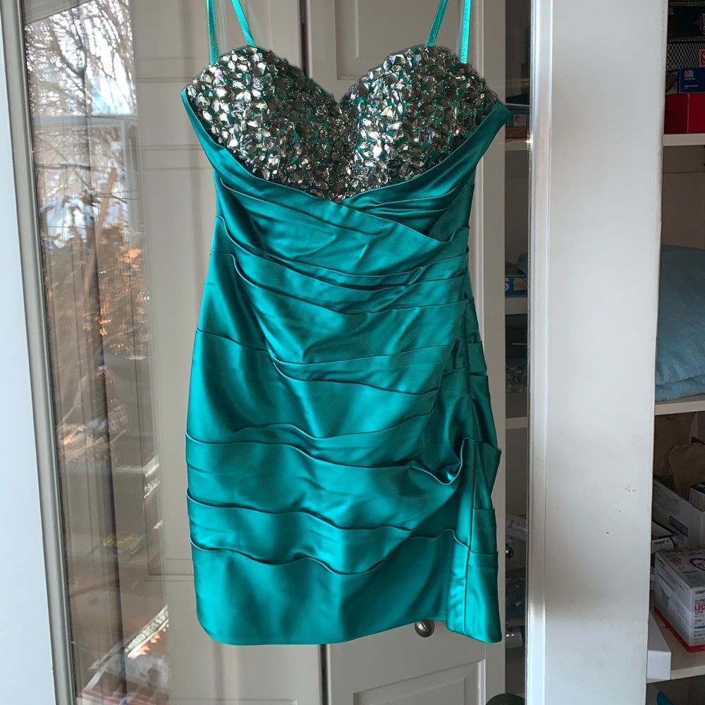 Emerald green bejeweled la femme mini dress